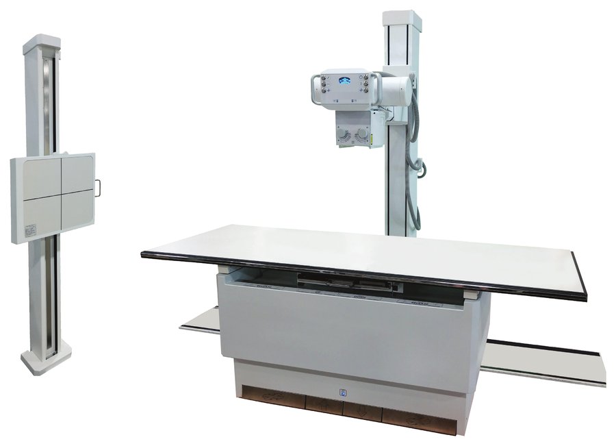 Radiographic room with floor-mounted tube stand, table and wall stand